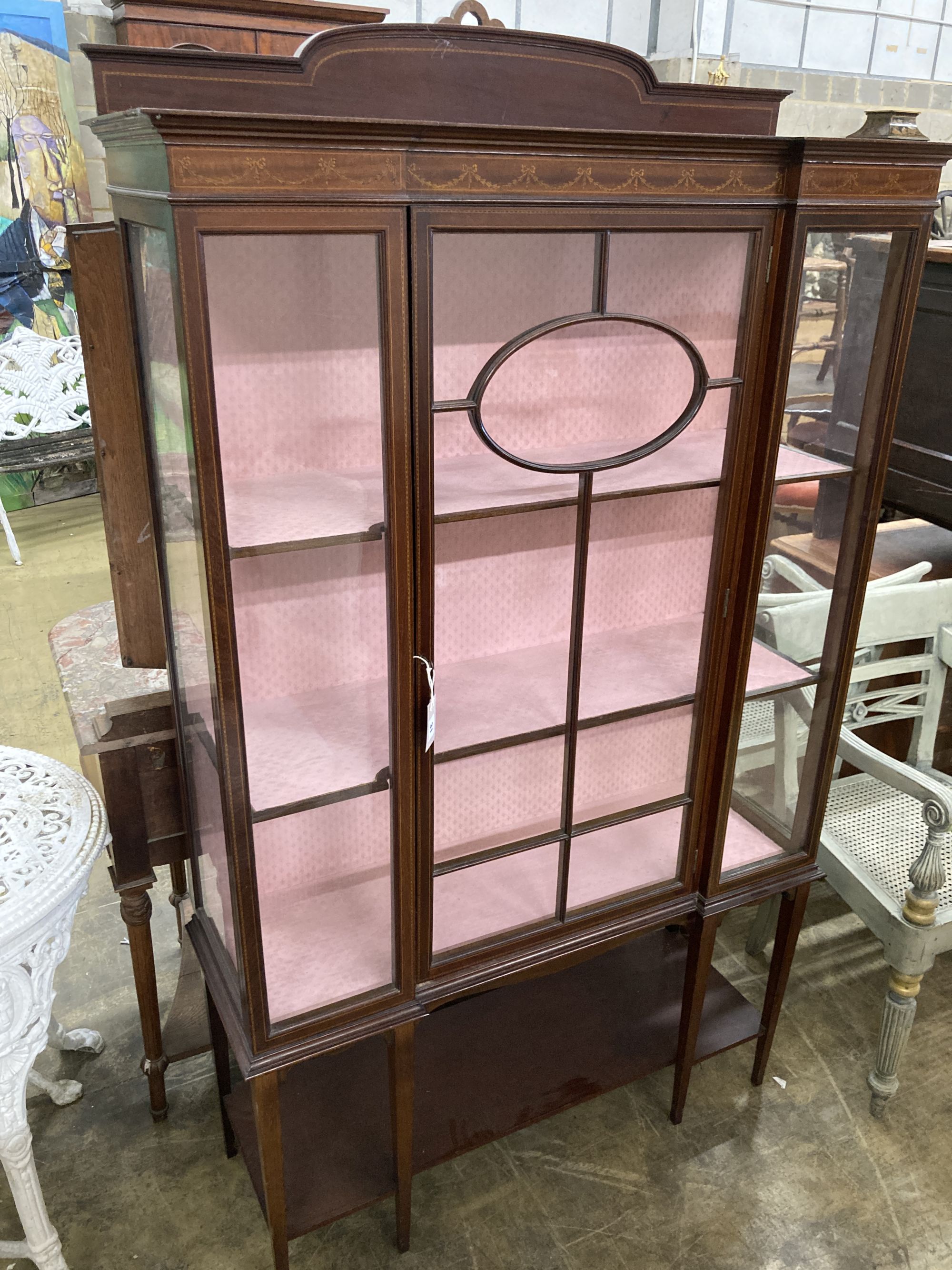An Edwardian inlaid mahogany display cabinet, width 106cm, depth 38cm, height 180cm